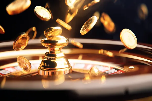 A player using their smartphone during a festive local event, representing CROWNDB’s fully mobile-friendly casino.